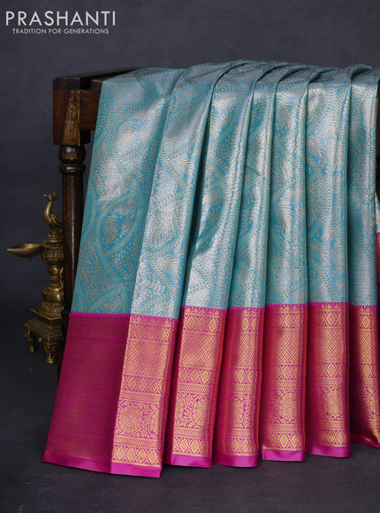 Bangalori tissue silk saree teal blue and purple with allover zari woven brocade weaves and long zari woven border