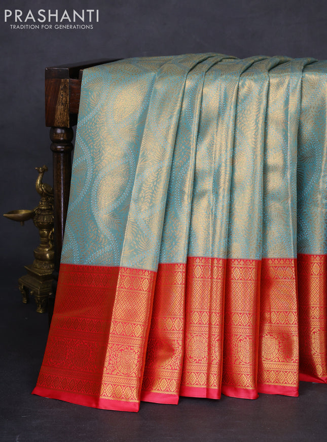 Bangalori tissue silk saree teal blue and reddish pink with allover zari woven brocade weaves and long zari woven border