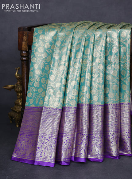 Bangalori tissue silk saree teal green shade and violet with allover zari woven brocade weaves and long zari woven border