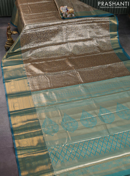 Bangalori tissue silk saree grey shade and peacock blue with allover zari woven brocade weaves and long zari woven border