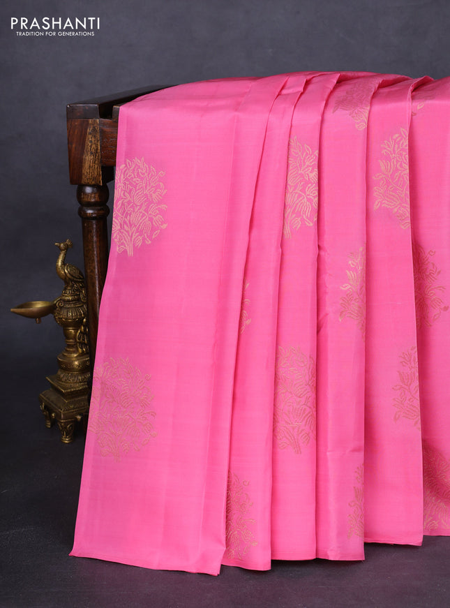 Kanchipuram silk saree light pink and dark mustard with copper zari woven buttas in borderless style