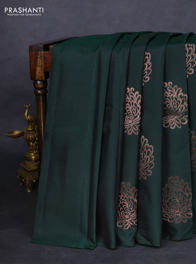 Kanchipuram silk saree bottle green and orange with copper zari woven buttas in borderless style