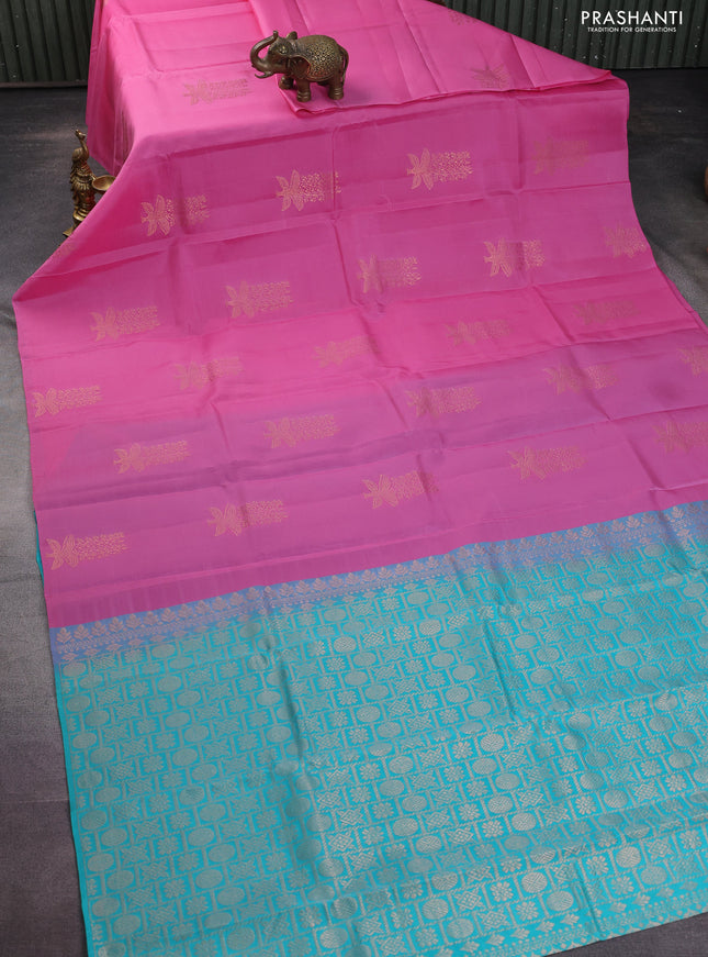 Kanchipuram silk saree light pink and teal blue with copper zari woven buttas in borderless style