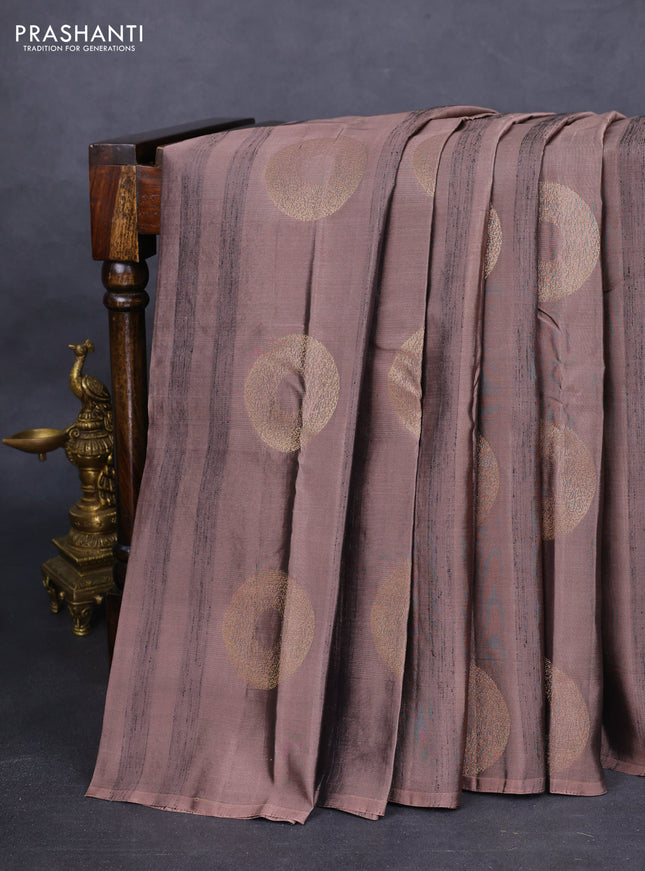 Kanchipuram silk saree pastel brown and dark mustard with zari woven buttas & jute finish in borderless style