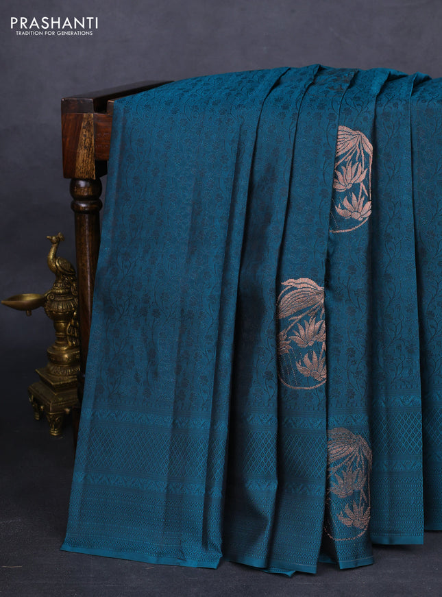 Kanchipuram silk saree peacock green and dark mustard with allover self emboss & copper zari buttas and self emboss border