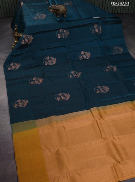 Kanchipuram silk saree peacock green and dark mustard with allover self emboss & copper zari buttas and self emboss border