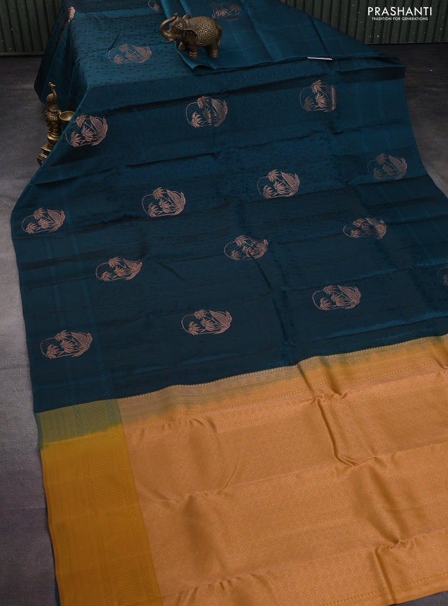 Kanchipuram silk saree peacock green and dark mustard with allover self emboss & copper zari buttas and self emboss border