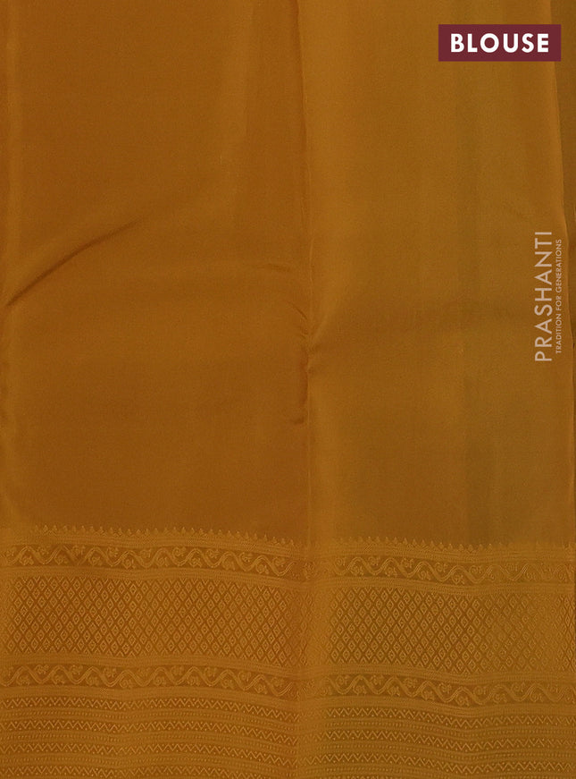 Kanchipuram silk saree peacock green and dark mustard with allover self emboss & copper zari buttas and self emboss border