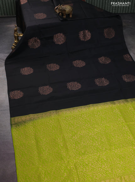Kanchipuram silk saree black and lime green with copper zari woven buttas in borderless style