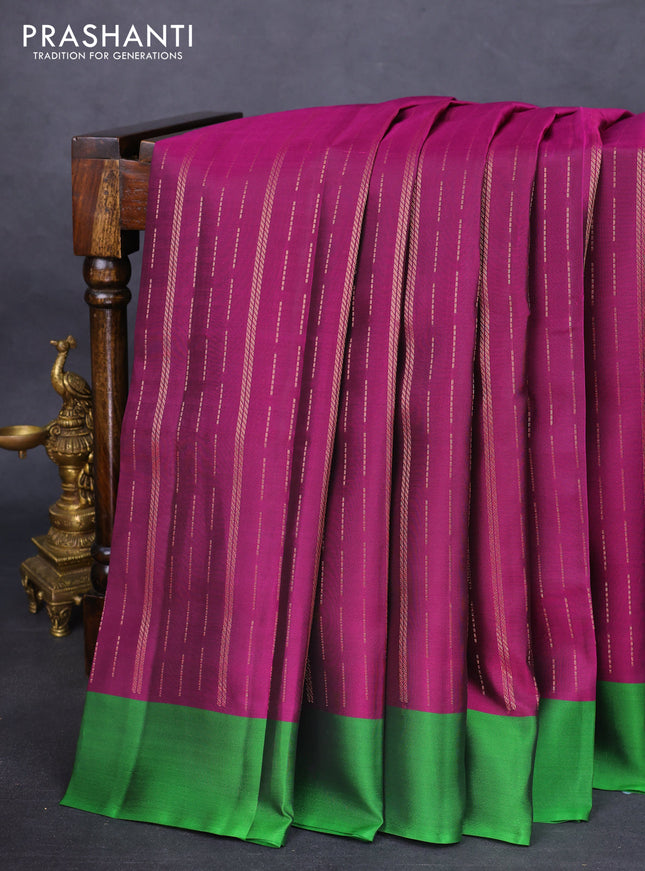 Kanchipuram silk saree purple and green with allover copper zari weaves and simple border