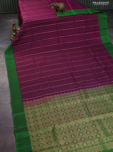 Kanchipuram silk saree purple and green with allover copper zari weaves and simple border