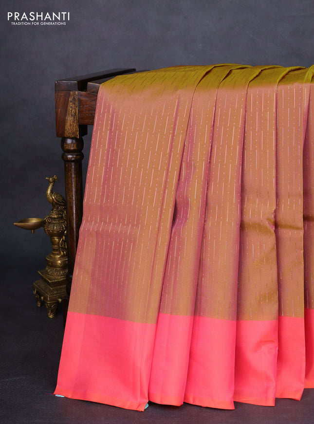 Kanchipuram silk saree dual shade of dark mustard and peach pink with allover copper zari weaves and simple border