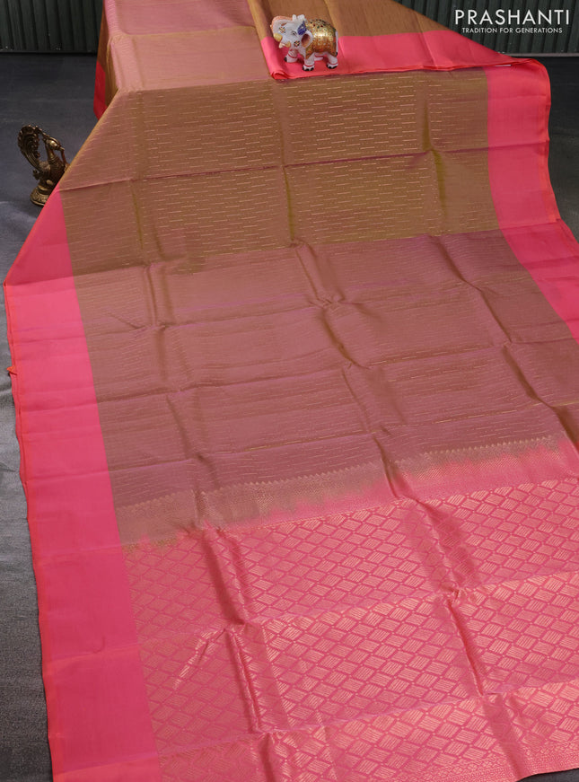 Kanchipuram silk saree dual shade of dark mustard and peach pink with allover copper zari weaves and simple border
