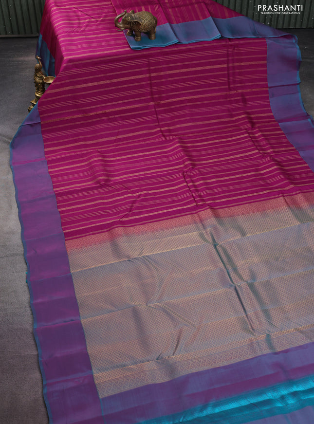Kanchipuram silk saree dark magenta pink and dual shade of teal blue with allover zari weaves and simple border