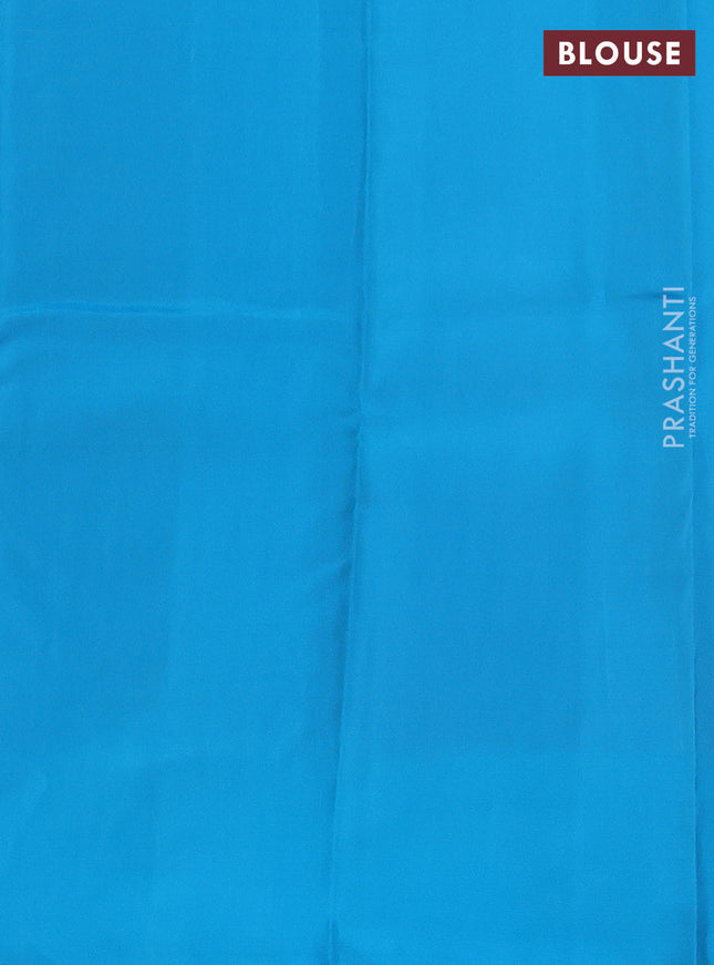 Kanchipuram silk saree dual shade of greyish pink and teal blue with allover copper zari woven butta weaves and simple border