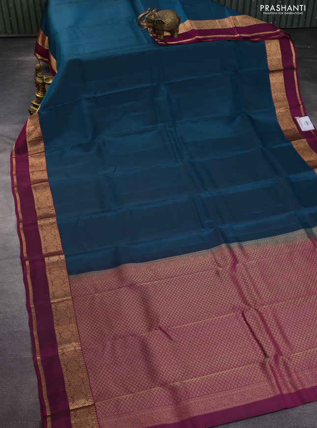 Kanchipuram silk saree peacock green and magenta pink with zari woven buttas and rettapet zari woven border