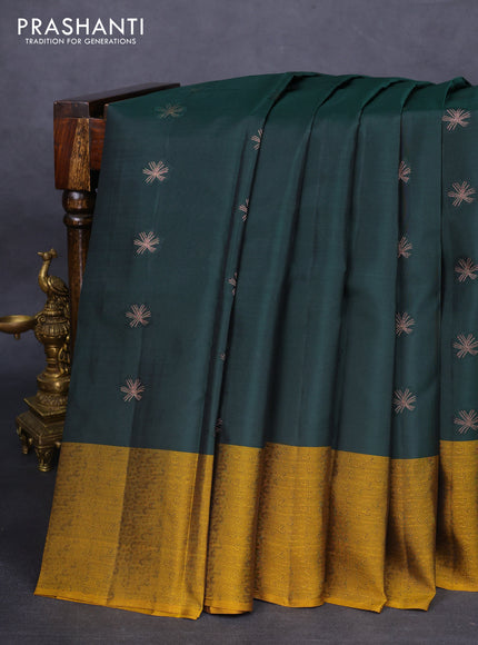 Kanchipuram silk saree dark green and mustard shade with zari woven buttas and self emboss border