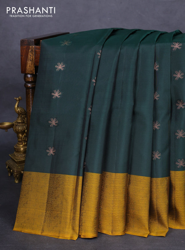 Kanchipuram silk saree dark green and mustard shade with zari woven buttas and self emboss border