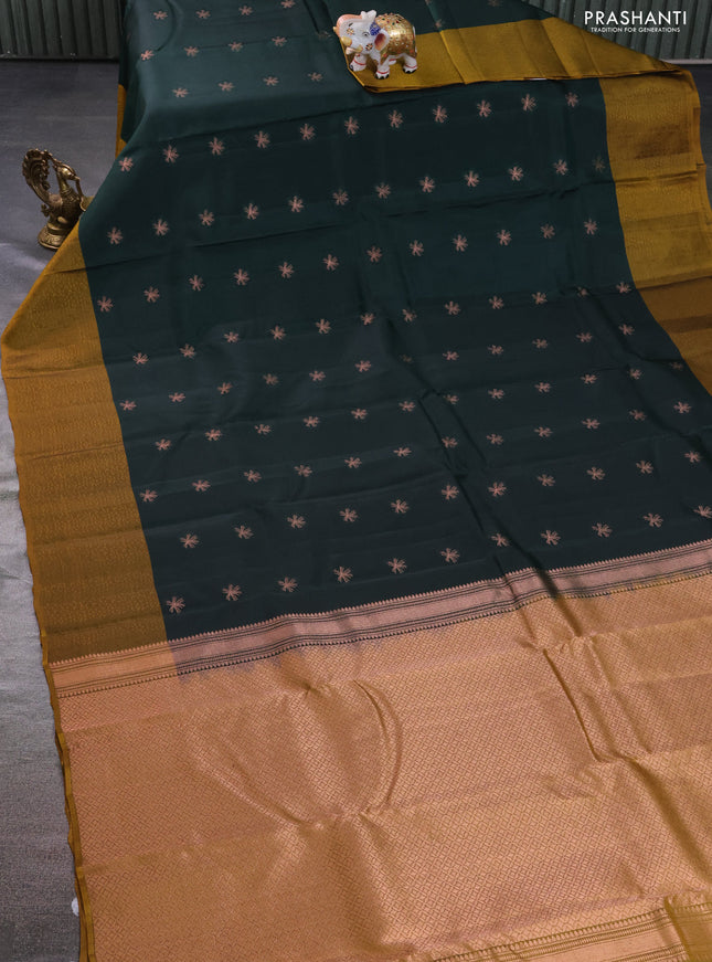 Kanchipuram silk saree dark green and mustard shade with zari woven buttas and self emboss border