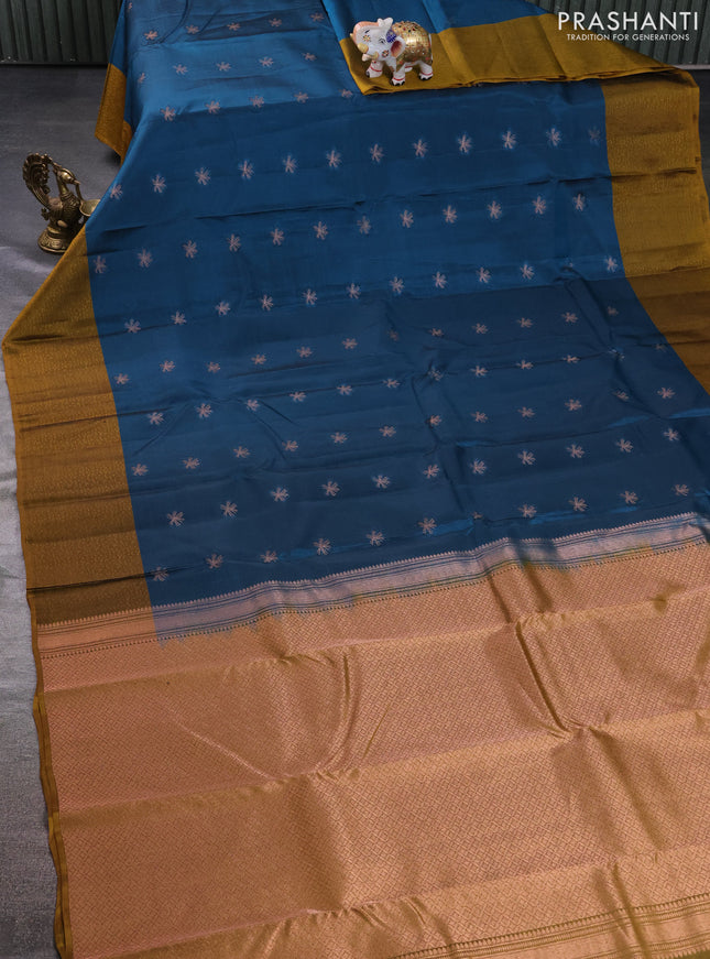 Kanchipuram silk saree peacock green and mustard shade with zari woven buttas and self emboss border
