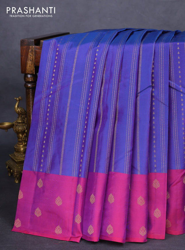 Kanchipuram silk saree dual shade of blue and magenta pink with allover zari weaves and zari woven butta border