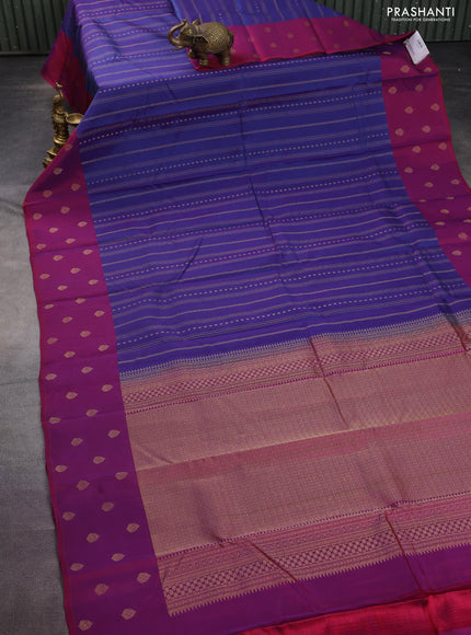 Kanchipuram silk saree dual shade of blue and magenta pink with allover zari weaves and zari woven butta border