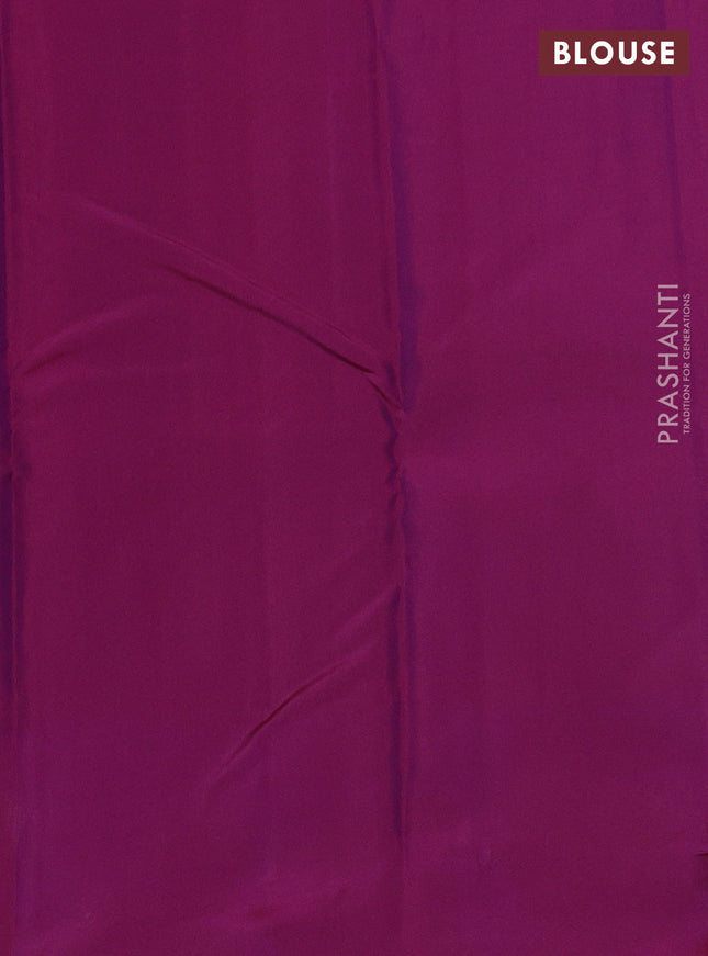 Kanchipuram silk saree dual shade of blue and magenta pink with allover zari weaves and zari woven butta border