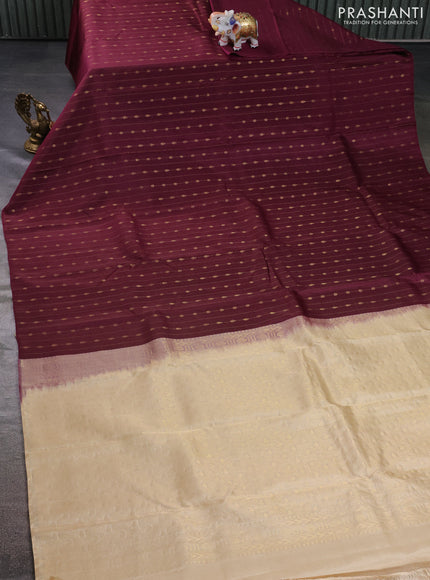 Kanchipuram silk saree wine shade and cream with allover zari weaves in borderless style