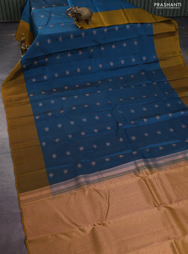 Kanchipuram silk saree peacock blue and dark mustard with zari woven buttas and self emboss border