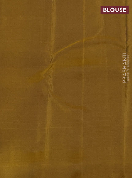 Kanchipuram silk saree peacock blue and dark mustard with zari woven buttas and self emboss border