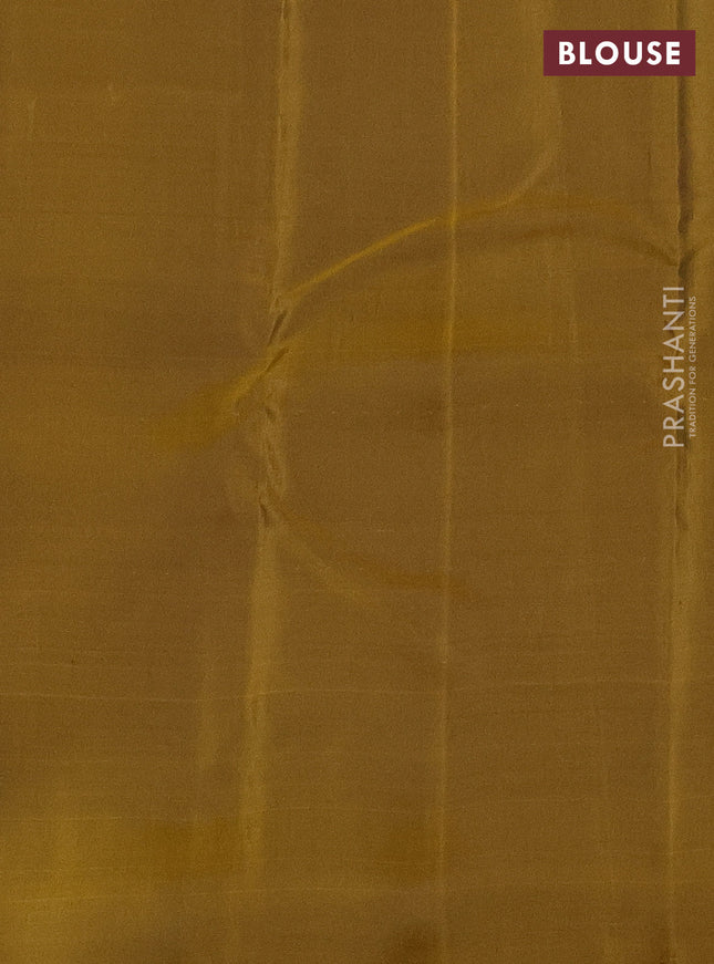 Kanchipuram silk saree peacock blue and dark mustard with zari woven buttas and self emboss border