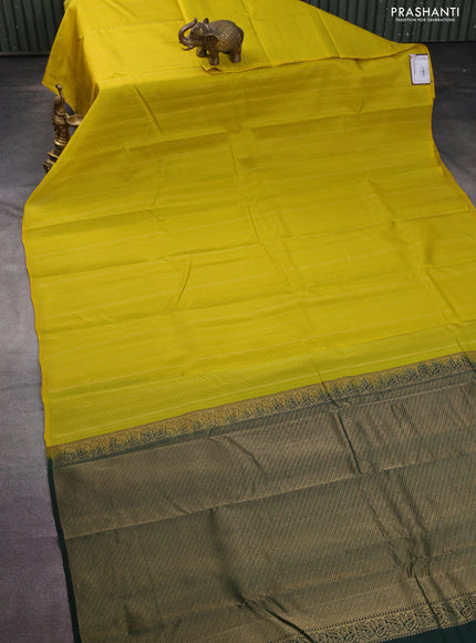 Kanchipuram silk saree lime yellow and bottle green with allover zari weaves & self emboss in borderless style