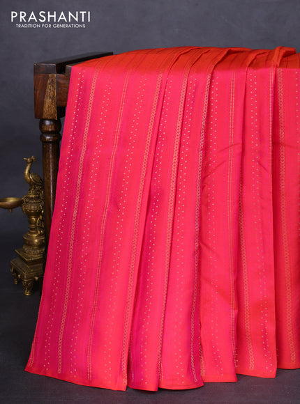 Kanchipuram silk saree dual shade of pinkish orange and beige with allover zari weaves & self emboss in borderless style