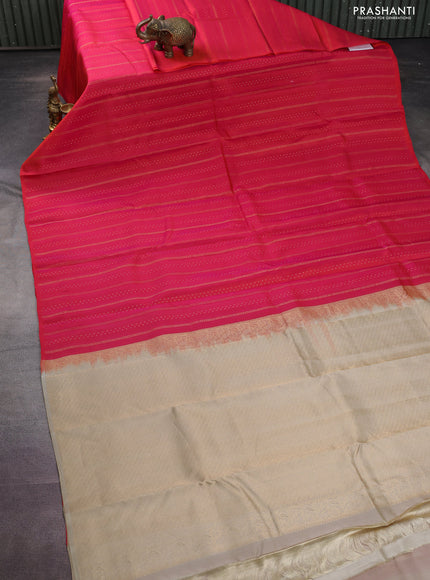 Kanchipuram silk saree dual shade of pinkish orange and beige with allover zari weaves & self emboss in borderless style