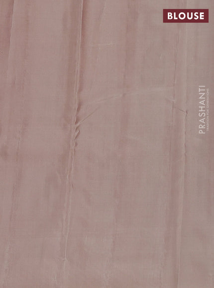 Kanchipuram silk saree dual shade of pinkish orange and beige with allover zari weaves & self emboss in borderless style