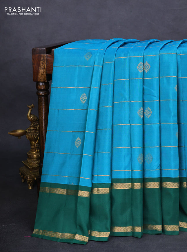 Kanchipuram silk saree cs blue and green with allover zari weaves & buttas and rettapet zari woven border