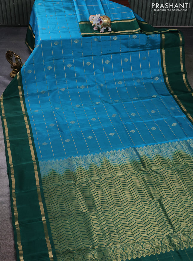 Kanchipuram silk saree cs blue and green with allover zari weaves & buttas and rettapet zari woven border