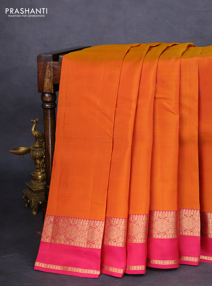 Kanchipuram silk saree mustard shade and pink with plain body and rettapet zari woven border
