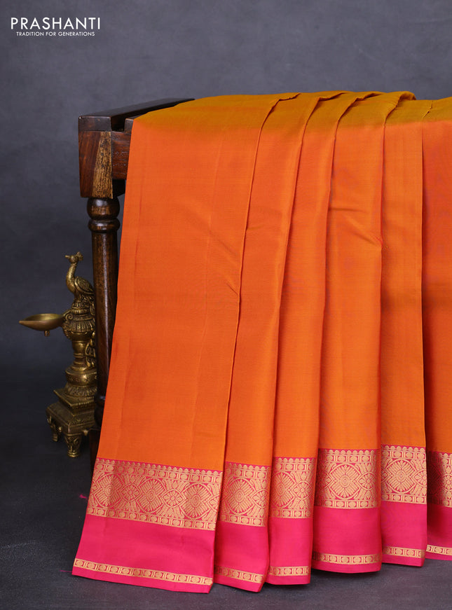 Kanchipuram silk saree mustard shade and pink with plain body and rettapet zari woven border