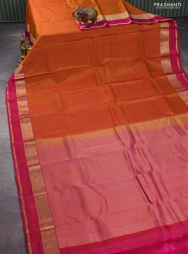 Kanchipuram silk saree mustard shade and pink with plain body and rettapet zari woven border
