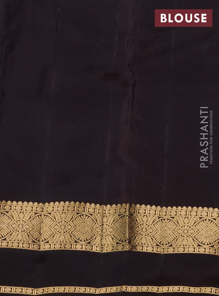 Kanchipuram silk saree green and brown with plain body and rettapet zari woven border