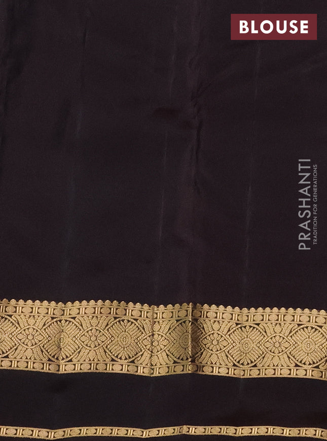 Kanchipuram silk saree green and brown with plain body and rettapet zari woven border