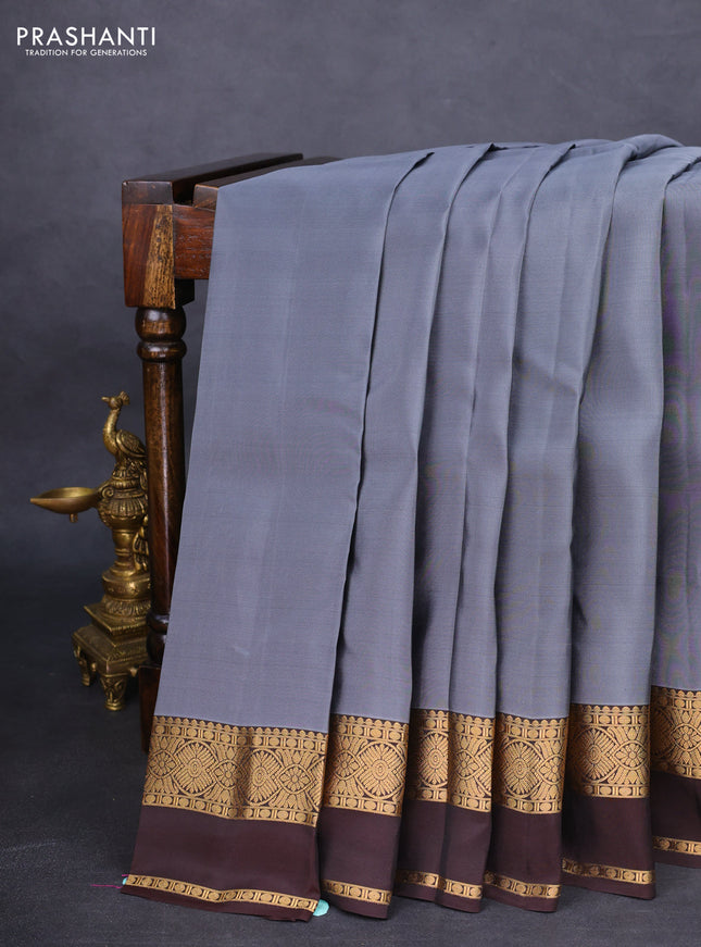 Kanchipuram silk saree grey and brown with plain body and rettapet zari woven border