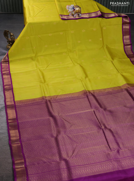 Kanchipuram silk saree lime yellow and purple with zari woven buttas and zari woven korvai border