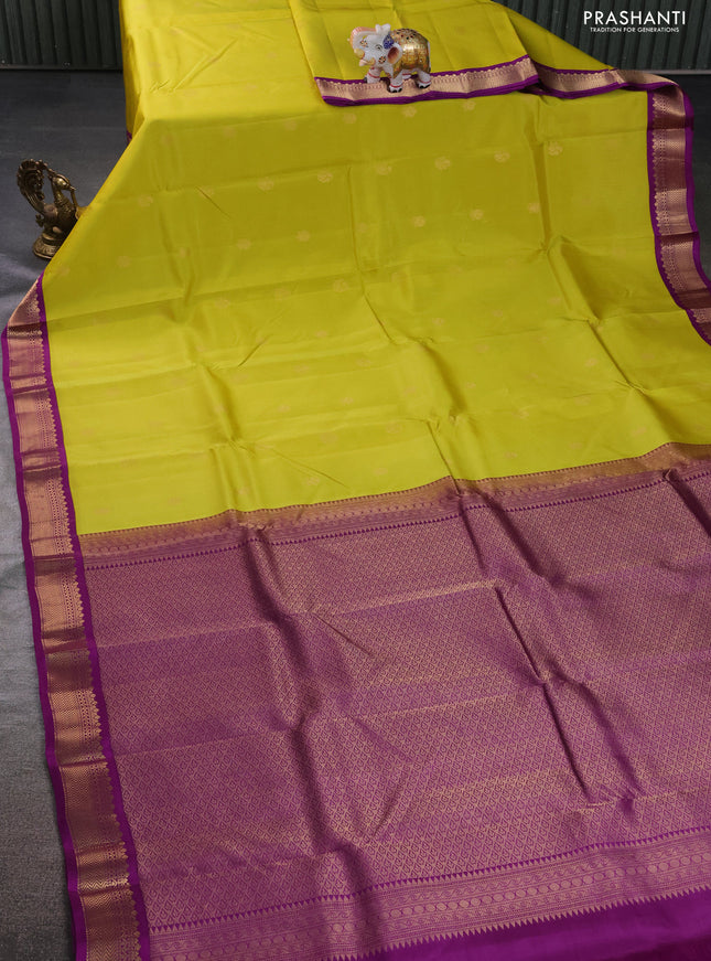 Kanchipuram silk saree lime yellow and purple with zari woven buttas and zari woven korvai border