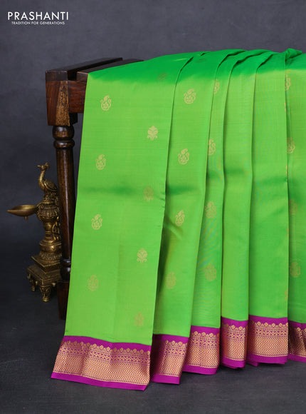 Kanchipuram silk saree parrot green and purple with zari woven buttas and zari woven korvai border