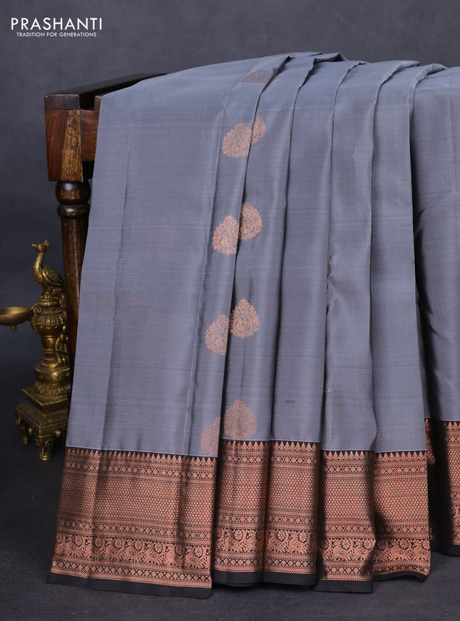 Kanchipuram silk saree grey and black with copper zari woven buttas and copper zari woven border