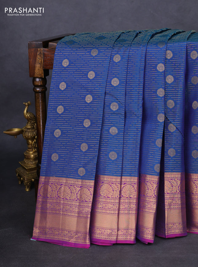 Kanchipuram silk saree peacock blue and purple with allover zari weaves and rich zari woven border