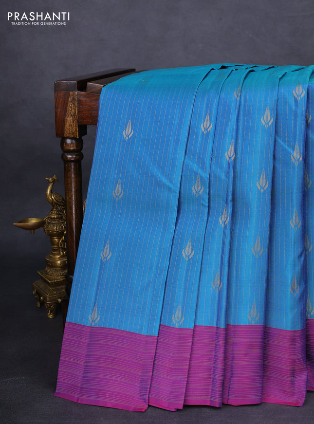 Kanchipuram silk saree dual shade of blue and purple with allover zari weaves and zari woven border