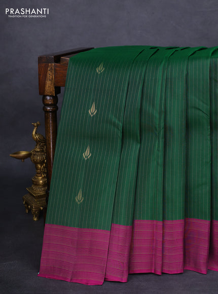 Kanchipuram silk saree dark green and purple with allover zari weaves and zari woven border